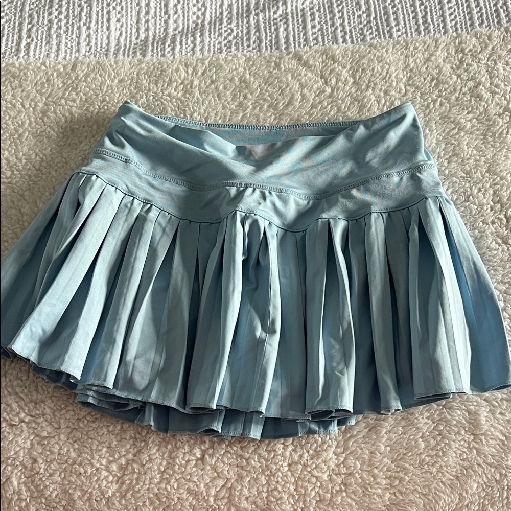 Gold hinge light blue skirt